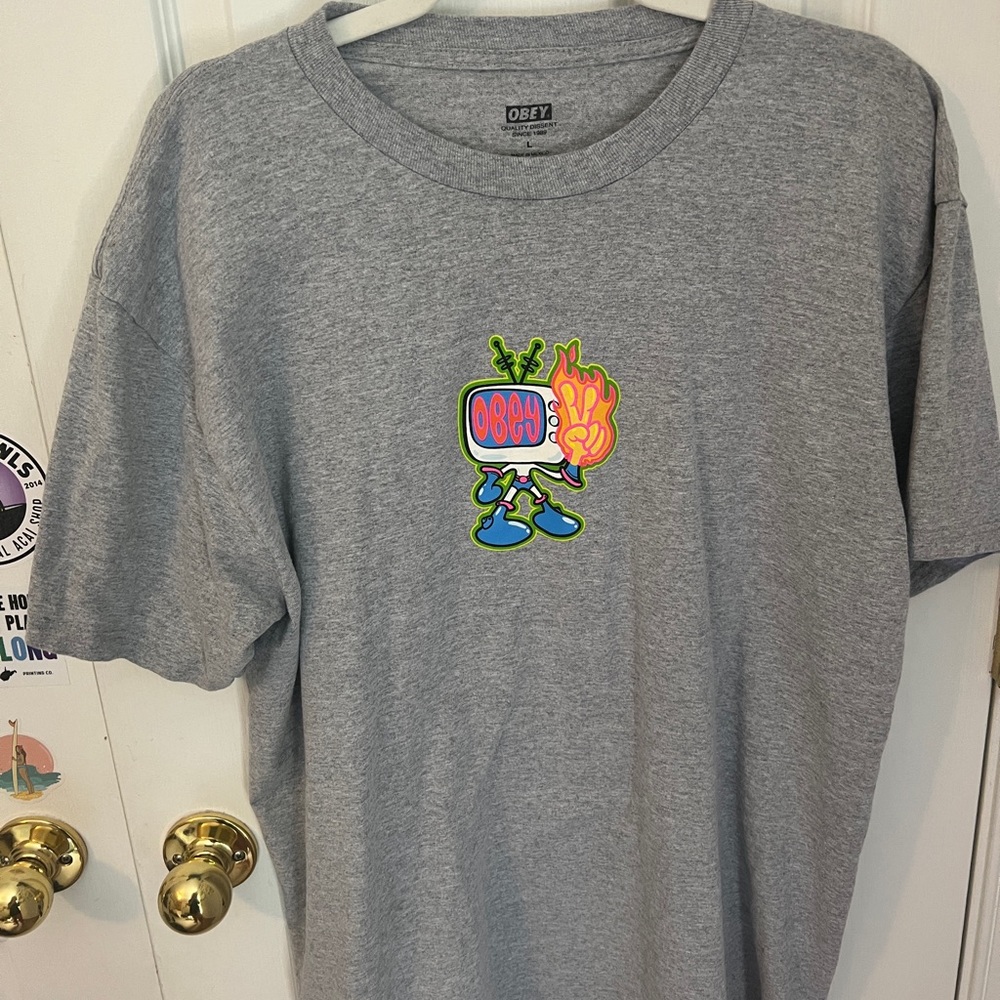 Obey short sleeve grey shirt.